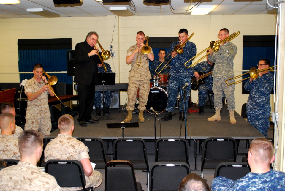 US Navy 110405-N-0000W-100 Bob McChesney, guest clinician and recording artist, plays with Sailors, Marines, staff and students at the School of Mu