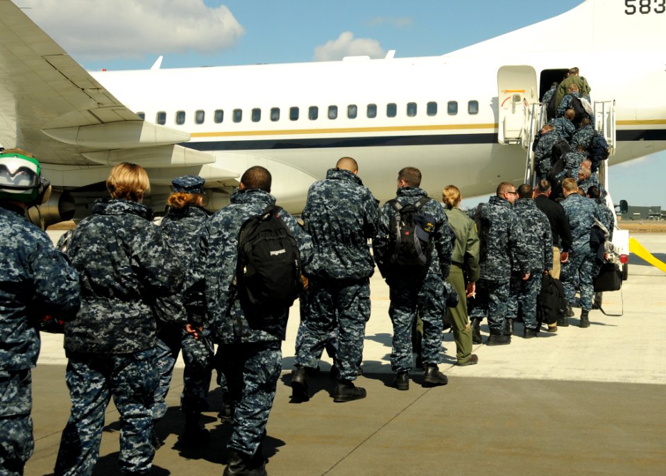US Navy 110404-N-VA590-105 Sailors board a McDonnell Douglas C-9 Skytrain o return to Naval Air Facility (NAF) Atsugi