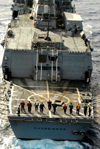 US Navy 110405-N-WP746-782 Sailors conduct a foreign object damage walk down before receiving a helicopter in waters surrounding the island of Oahu