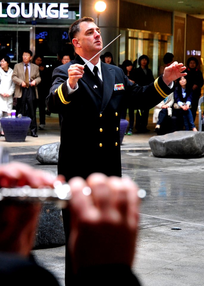 US Navy 110407-N-RO948-057 Fleet Band Master Lt. Robert Wrenn leads the U.S. 7th Fleet Band at the Changwon City Mall