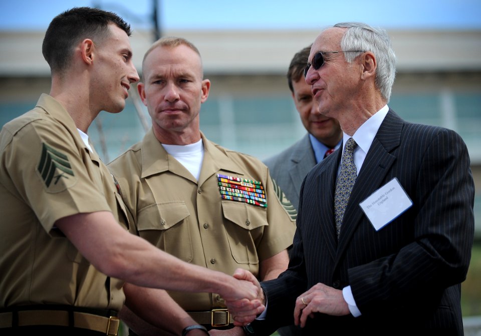 US Navy 110410-N-MG658-015 Hon. Gordon England speaks with wounded Marines after an outdoor reception for the Navy Safe Harbor and Wounded Warrior