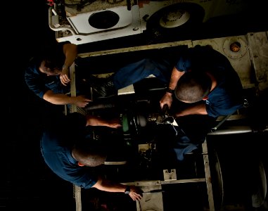 US Navy 110407-N-DR144-059 viation Support Equipment Technician Airman Scott Jensen, left, Aviation Support Equipment Technician 3rd Class Peter Za