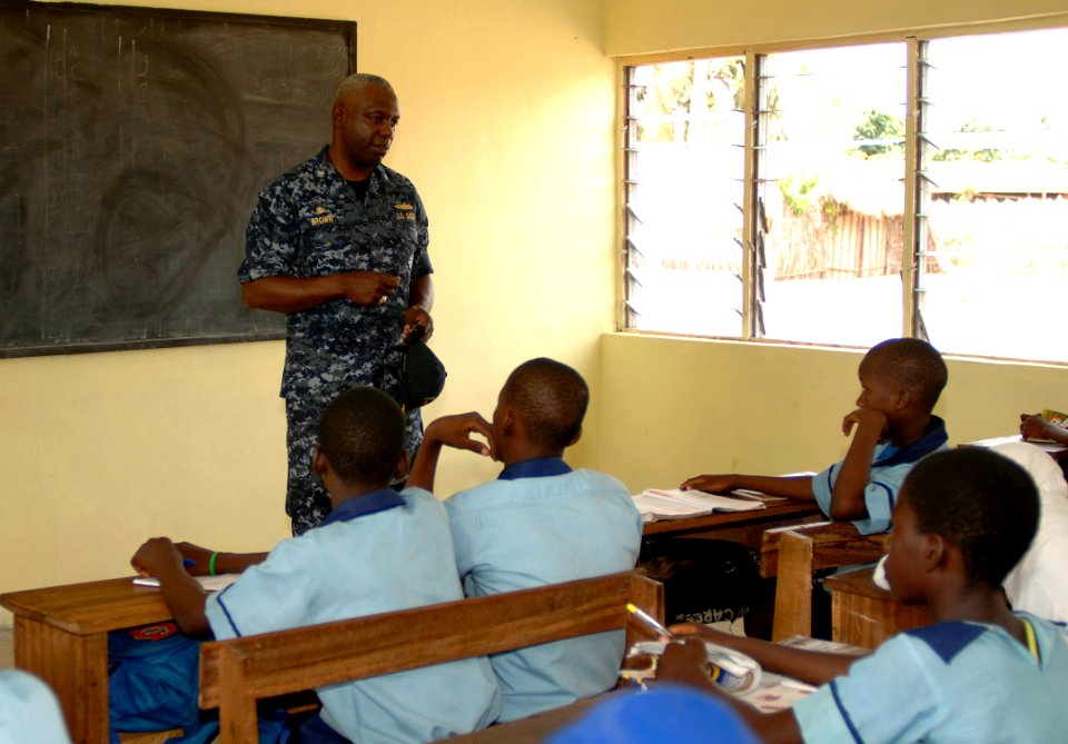 US Navy 110407-N-HI707-766 Cmdr. Darryl Brown speaks with students at the Light of Dawn Government Junior Secondary School Tomarow during a communi