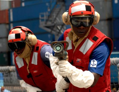 US Navy 110407-N-HI707-931 A Nigerian firefighting team practice hose handling during a damage control drill aboard USS Robert G. Bradley (FFG 49)