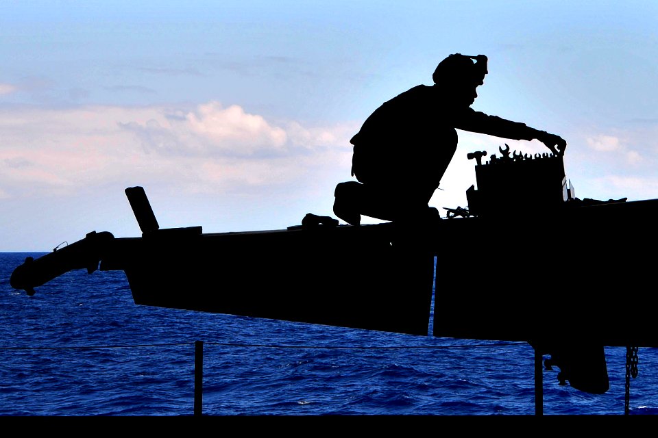 US Navy 110408-N-1004S-132 Aviation Structural Mechanic Airman Samuel Delrosario, from Tucson, Ariz., assigned to the Blue Diamonds of Strike Fight