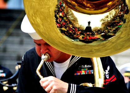 US Navy 110406-N-RO948-149 Musician 2nd Class Eric Cavender plays the tuba as the U.S. 7th Fleet Band performs at a city park while on tour in the