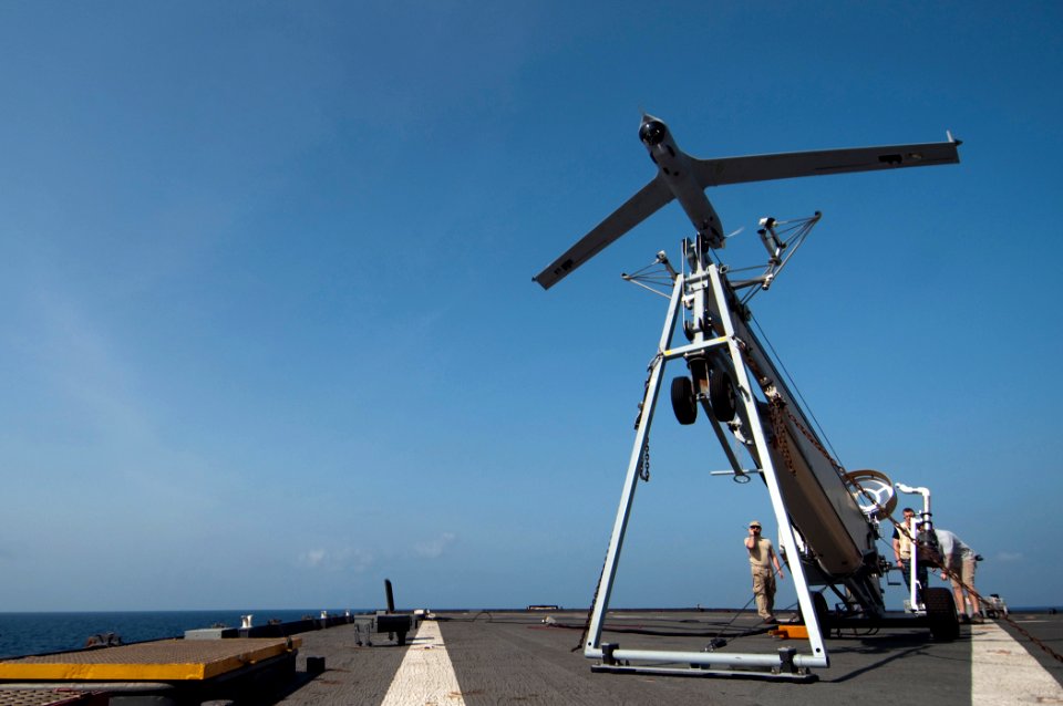 US Navy 110411-N-RC734-058 A Scan Eagle unmanned aerial vehicle (UAV) launches from the flight deck of the amphibious dock landing ship USS Comstoc