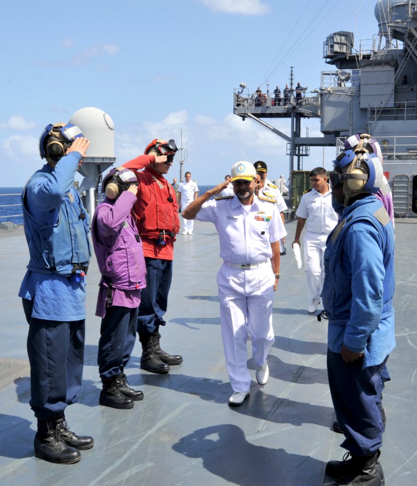 US Navy 110407-N-0864H-506 Rear Adm. Harish Bisht salutes side boys while departing USS Blue Ridge (LCC 19) during a visit in support of exercise M
