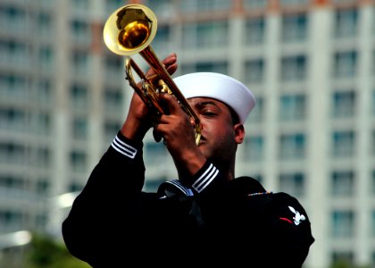 US Navy 110410-N-RO948-017 Musician 3rd Class Michael Bookman Jr. plays the trumpet during a performance at the 2011 Jinhae International Military