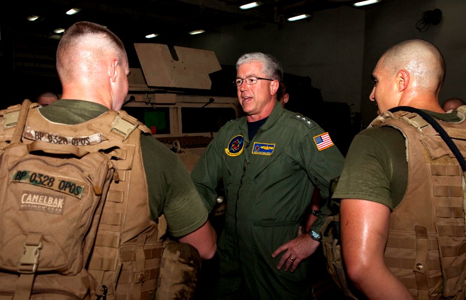 US Navy 110411-N-QP268-036 Vice Adm. Daniel Holloway, center, commander of the U.S. 2nd Fleet, meets with Marines from the 22nd Marine Expeditionar
