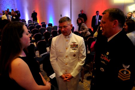 US Navy 110407-N-4930E-646 Master Chief Petty Officer (MCPON) Rick D. West, center, speaks with this year's Navy Military Child of the Year recipie