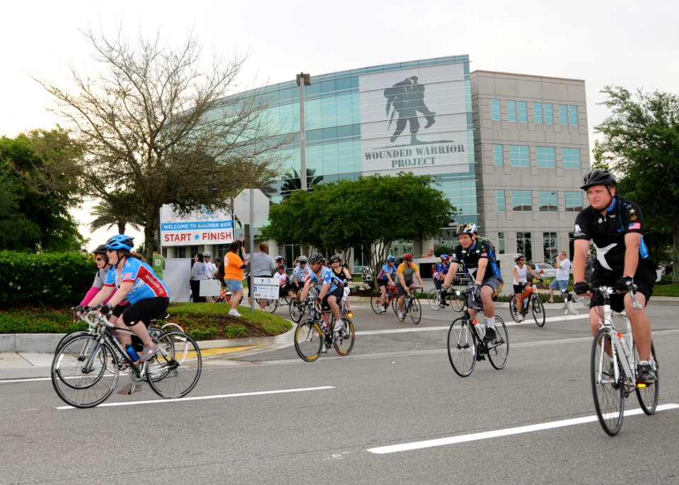 US Navy 110409-N-DD445-003 Participants in the 2011 Soldier Ride peddle through Jacksonville to support the Wounded Warrior Project