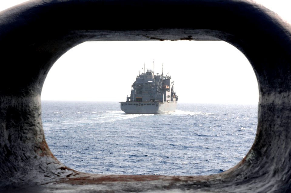 US Navy 110409-N-RC734-016 The Military Sealift Command dry cargo and ammunition ship USNS Alan Shepard (T-AKE 3) pulls away from the amphibious do