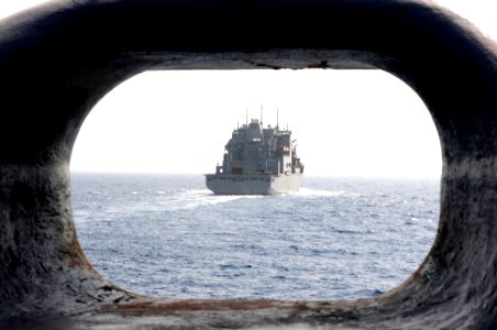 US Navy 110409-N-RC734-016 The Military Sealift Command dry cargo and ammunition ship USNS Alan Shepard (T-AKE 3) pulls away from the amphibious do