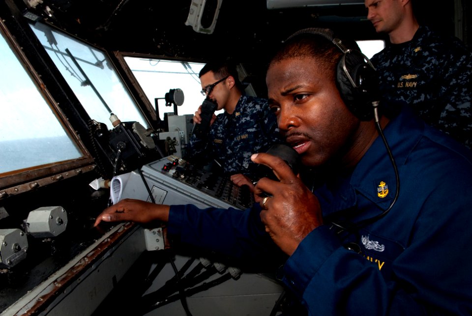 US Navy 110412-N-QP268-037 Sailors prepare for flight deck operations aboard the amphibious dock landing ship USS Whidbey Island (LSD 41)