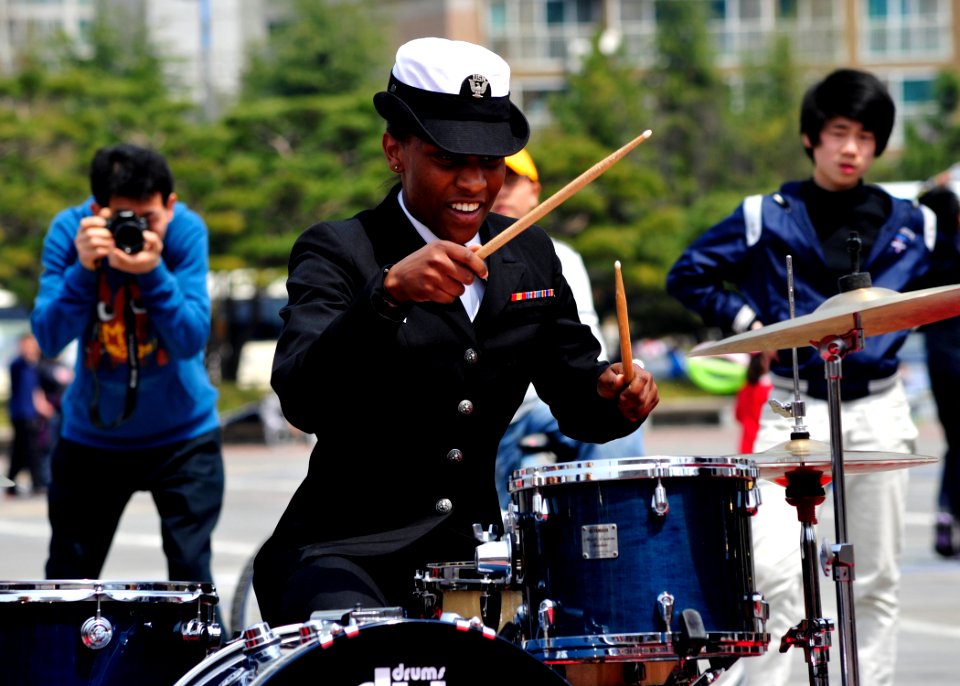 US Navy 110410-N-RO948-030 Musician 3rd Class Camellia Akhamie performs with the U.S. 7th Fleet Band during the 2011 Jinhae International Military
