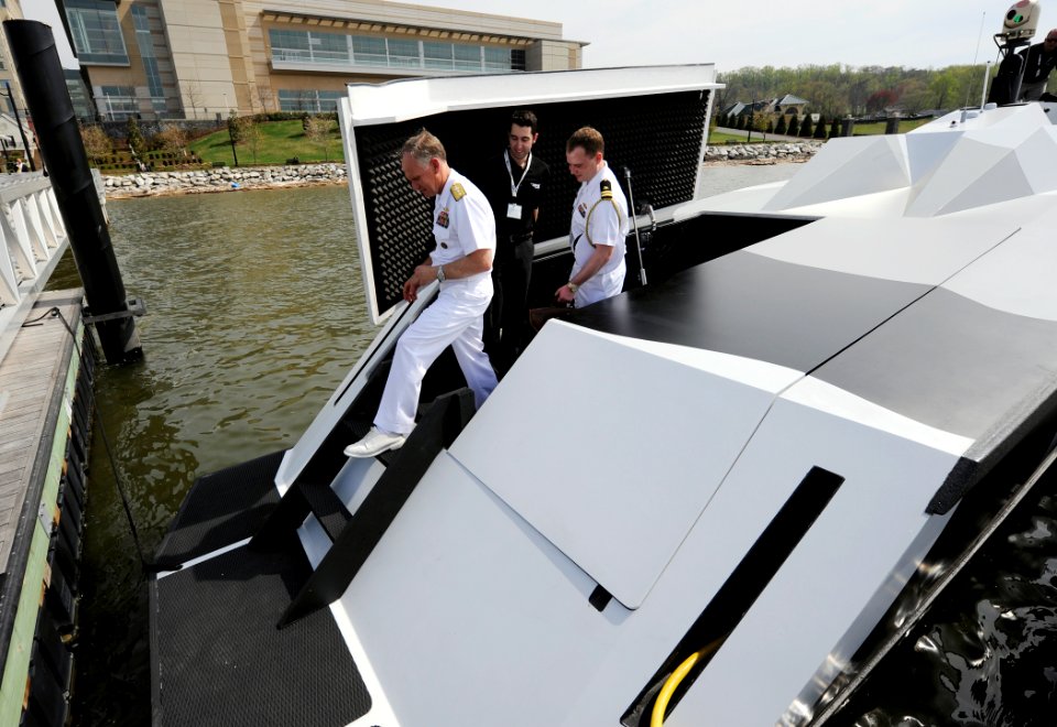 US Navy 110411-N-PO203-042 Rear Adm. Nevin P. Carr, Chief of Naval Research, completes a tour of the Piranha unmanned surface vehicle at the 2011 S
