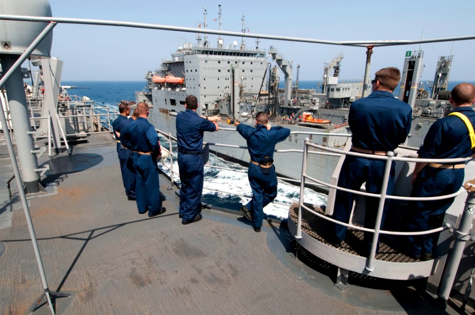 US Navy 110409-N-RC734-091 Sailors stand watch on the port bridge wing aboard the amphibious dock landing ship USS Comstock (LSD 45) during an unde