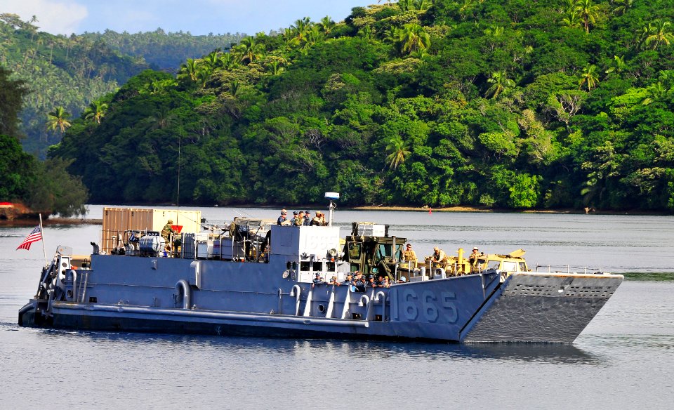 US Navy 110413-N-KB563-120 A landing craft utility (LCU) from the amphibious transport dock ship USS Cleveland (LPD 7) pulls into the main wharf du