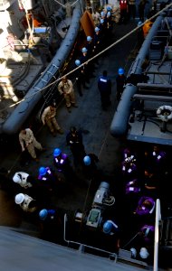 US Navy 110413-N-OS574-059 Sailors heave lines on the boat deck aboard the San Antonio-class amphibious transport dock ship USS Mesa Verde (LPD 19)