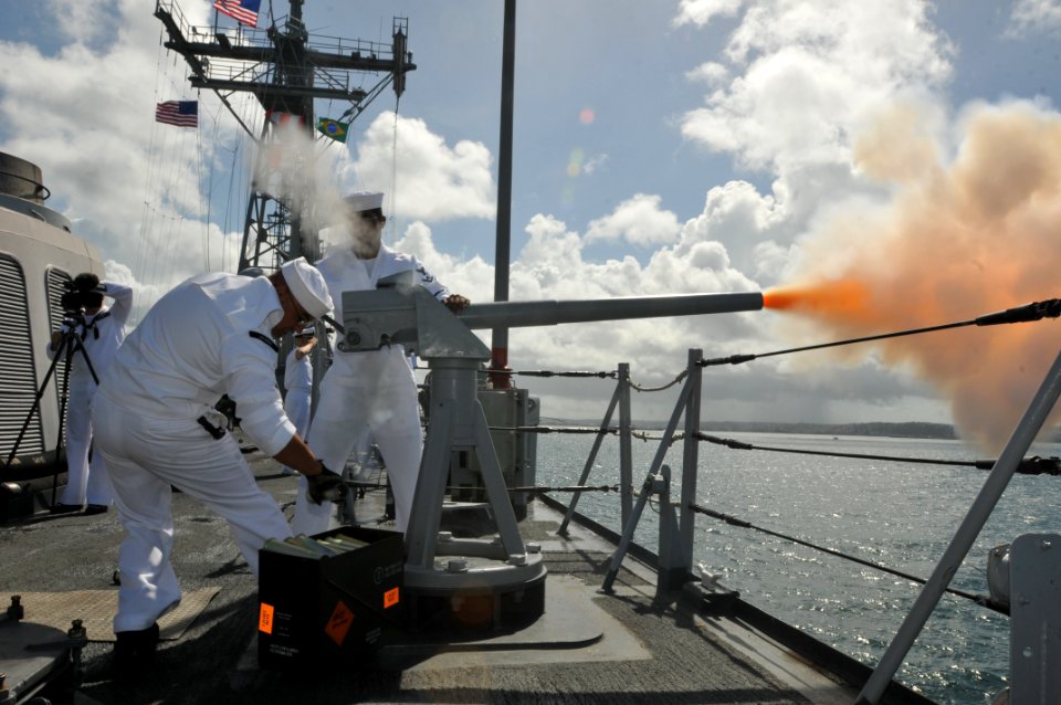 US Navy 110415-N-NL541-055 Sailors assigned to USS Boone (FFG 28) fire the 40 mm saluting battery to greet the port city of Salvador, Brazil