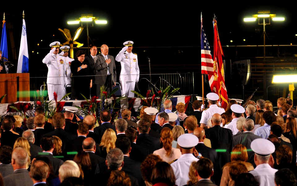 US Navy 110416-N-DX615-016 Distinguished guests attending the christening ceremony for USNS William McLean (T-AKE 12) render honors as the Marine C