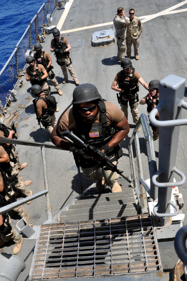 US Navy 110414-N-7293M-296 Aviation Ordnanceman Airman Albert Frank, assigned to the visit board, search and seizure (VBSS) team from the amphibiou