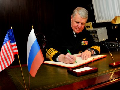 US Navy 110415-N-ZB612-479 Chief of Naval Operations (CNO) Adm. Gary Roughead signs the guest book of the Russian Federation Navy nuclear-powered c