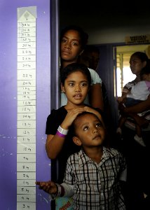 US Navy 110414-N-YM863-165 Children wait for pediatric care during a Pacific Partnership medical and civil assistance program at a Vava'u hospital photo