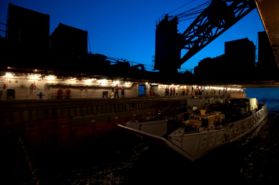 US Navy 110416-N-RC734-034 Landing Craft Utility (LCU) 1632, assigned to Assault Craft Unit (ACU) 1, departs the well deck of the amphibious dock l