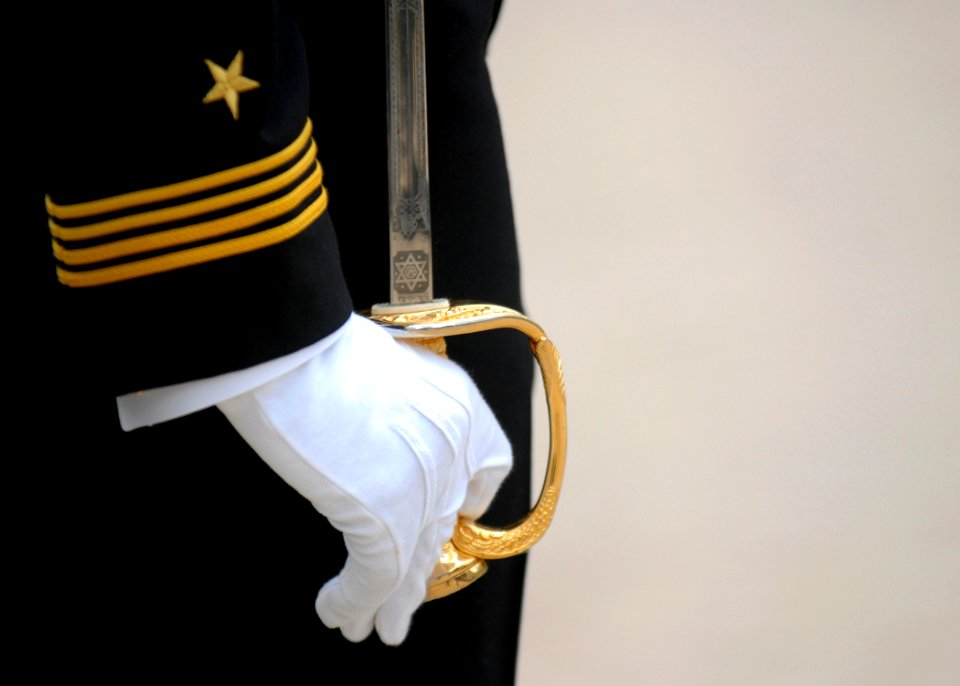 US Navy 110413-N-OA833-001 A U.S. Naval Academy midshipman stands at attention before a formal parade on the school's campus