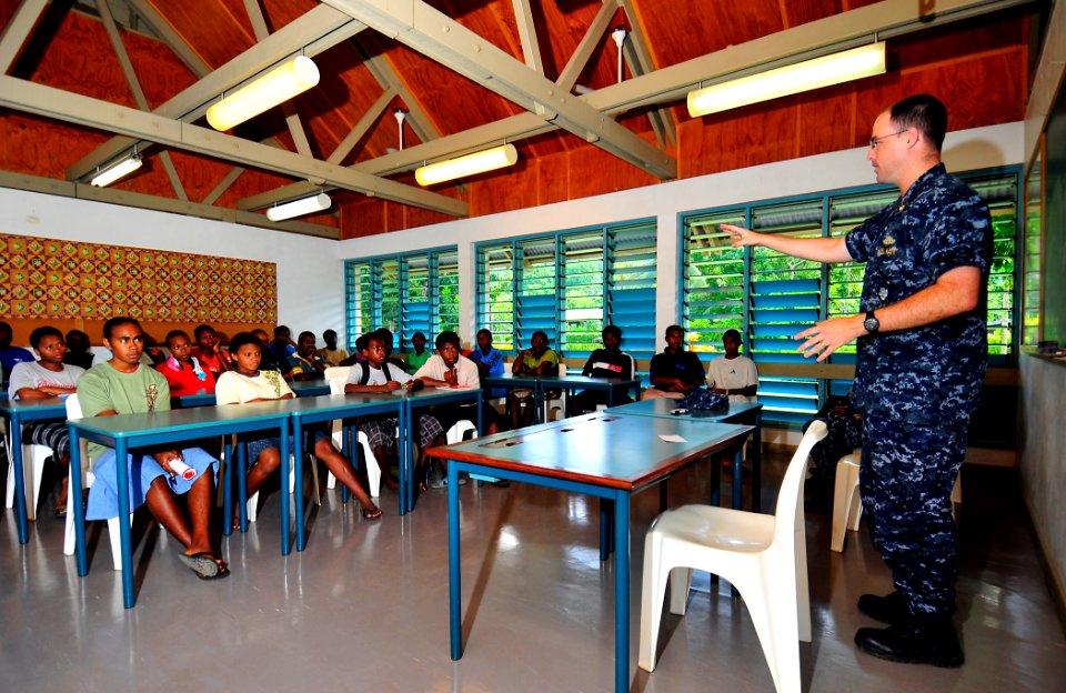 US Navy 110419-N-KB563-020 Lt. Cmdr. Casey Mahon, advanced echelon officer in charge of Pacific Partnership 2011, speaks to students from Universit