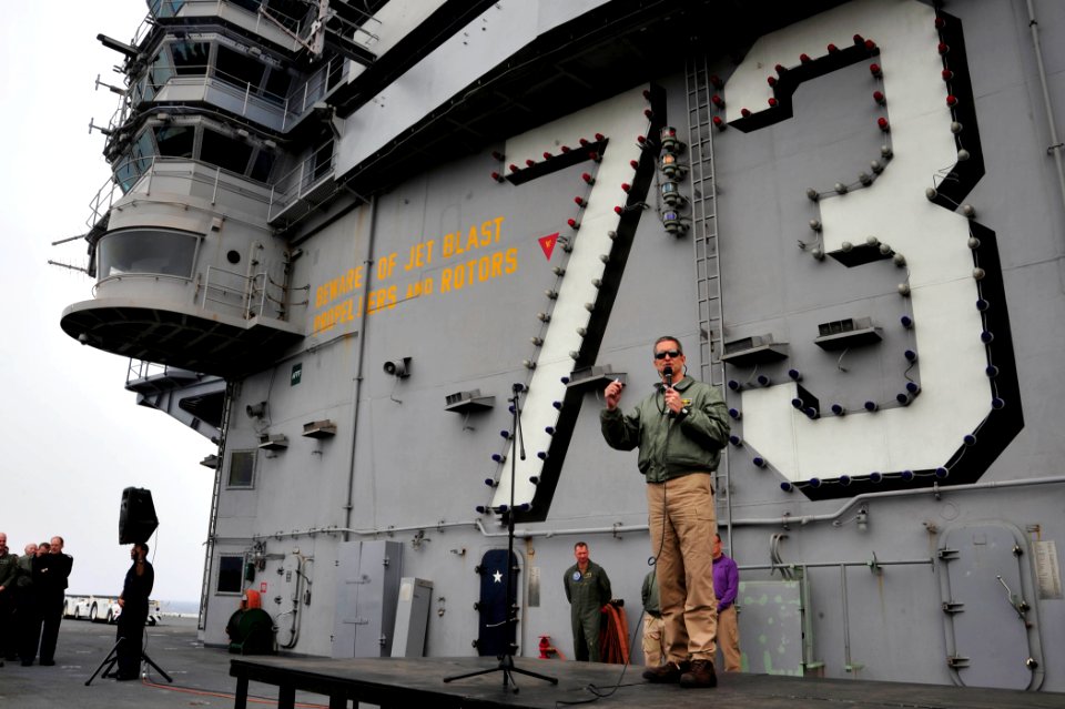 US Navy 110419-N-VL413-143 Capt. David Lausman, commanding officer of the aircraft carrier USS George Washington (CVN 73) addresses the crew during