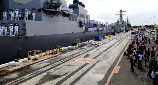 US Navy 110415-N-VM928-025 Sailors man the rails aboard the guided-missile destroyer USS Hopper (DDG 70) as the ship prepares to depart Joint Base photo