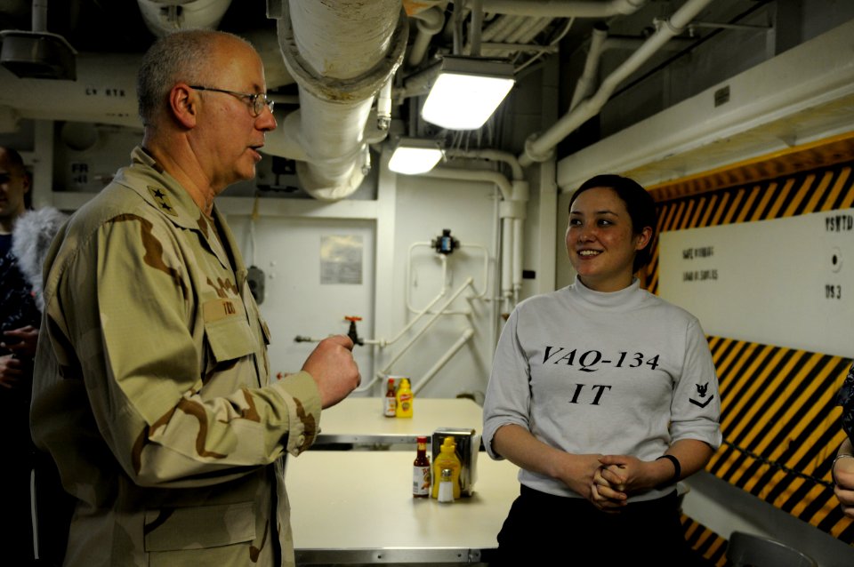 US Navy 110416-N-8040H-328 Rear Adm. Mark L. Tidd, chief of chaplains, speaks with Information Systems Technician 3rd Class Kathleen Brigham
