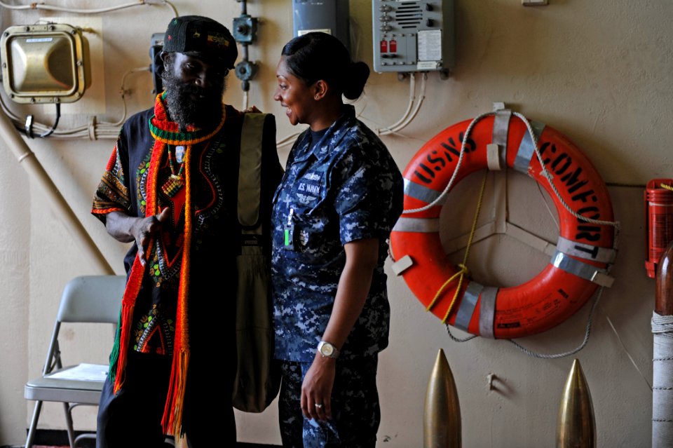US Navy 110419-F-ET173-184 Hospital Corpsman 2nd Class Melecia Reid gives a tour of the Military Sealift Command hospital ship USNS Comfort (T-AH 2