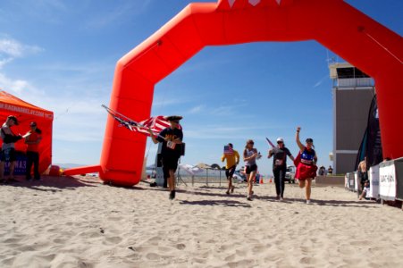US Navy 110416-N-ZC343-571 Sailors assigned to USS Bonhomme Richard (LHD 6) cross the finish line of the 200.9-mile Ragnar Relay Race