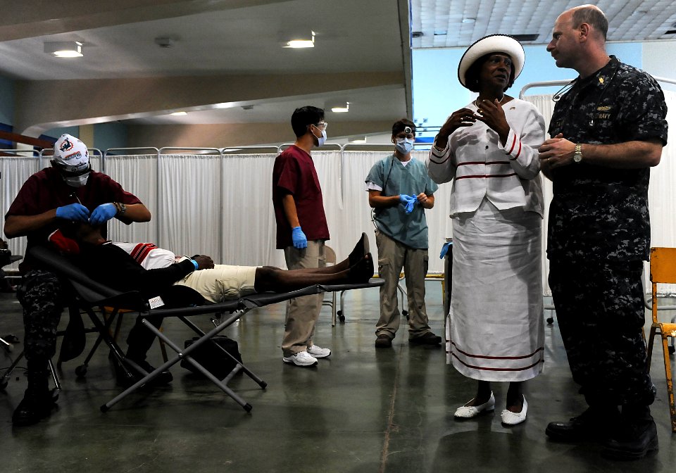 US Navy 110415-F-ET173-266 Capt. David Tanen, right, site leader at the Continuing Promise 2011 medical community service event at the National Spo