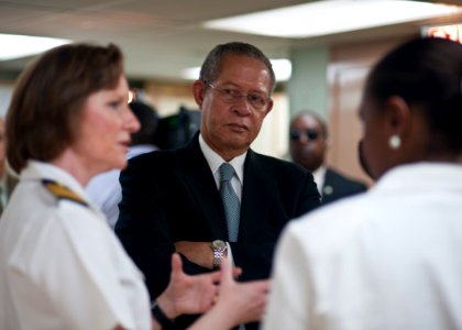 US Navy 110420-N-NY820-170 Jamaican Prime Minister Bruce Golding, center, discusses the capabilities of the Military Sealift Command hospital ship