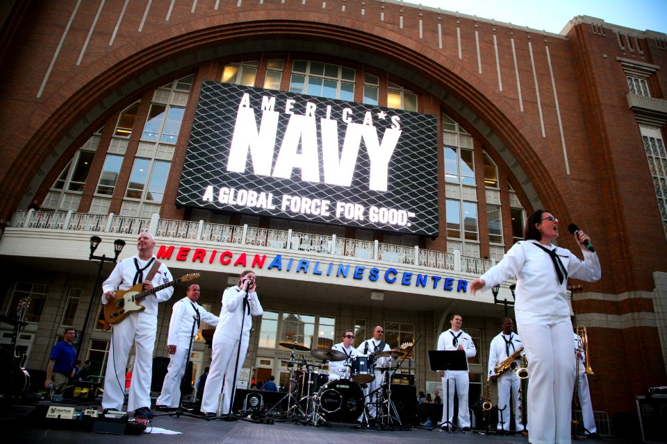US Navy 110416-N-YM440-079 The U.S. Navy blues band, Freedom, performs before a Dallas-Mavericks playoff game at American Airlines Center