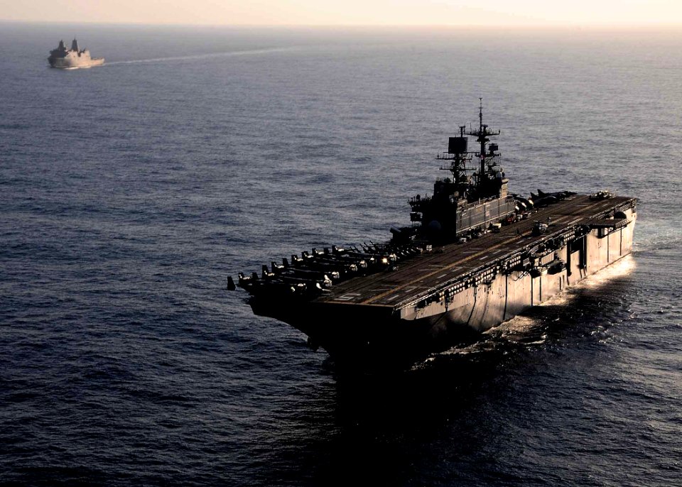 US Navy 110416-N-7508R-005 The multipurpose amphibious assault ship USS Bataan (LHD 5) is underway with the amphibious transport dock ship USS Mesa