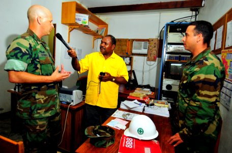 US Navy 110419-N-KB563-004 Lt. Wesley Howard, left, officer in charge of Naval Mobile Construction Battalion (NMCB) 133, and Lt. j.g Ken Garcia are