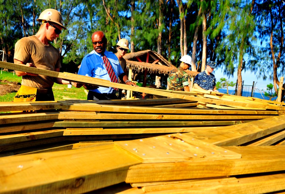 US Navy 110419-N-KB563-251 Seabees assigned to Naval Mobile Construction Battalion (NMCB) 133 show Secretary General of Sanma Province Joel Path a