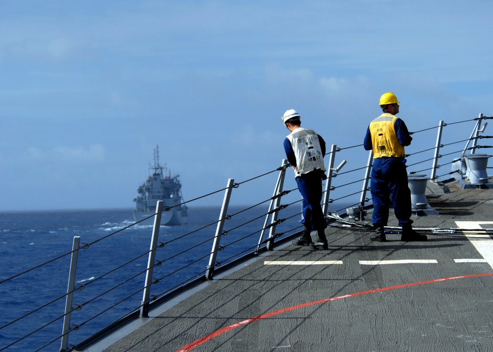 US Navy 110421-N-ZI300-017 Sailors aboard the guided-missile destroyer USS Nitze (DDG 94) prepare for a replenishment at sea with the Brazilian nav
