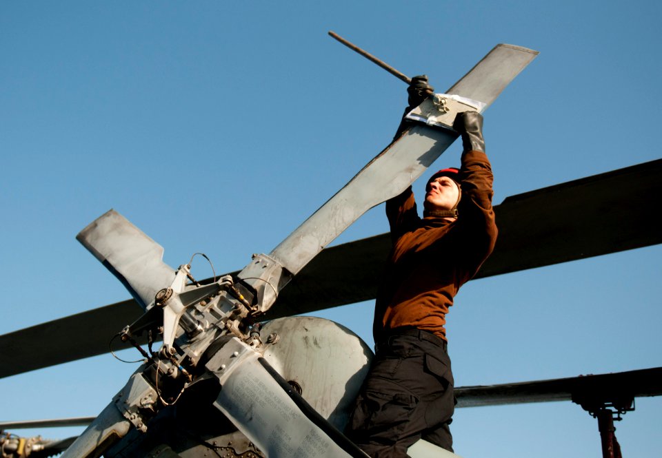 US Navy 110422-N-6505H-294 Aviation Structural Mechanic Airman Brian Smith, assigned to Helicopter Anti-submarine Squadron (HS) 15