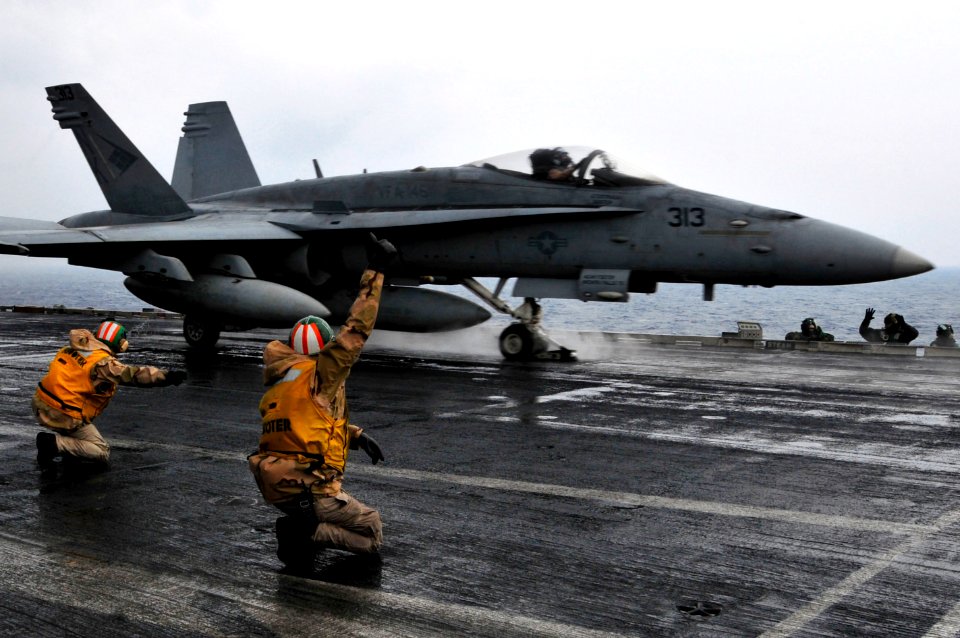 US Navy 110423-N-DM338-113 Sailors launch an F-A-18C Hornet from the aircraft carrier USS Ronald Reagan (CVN 76)