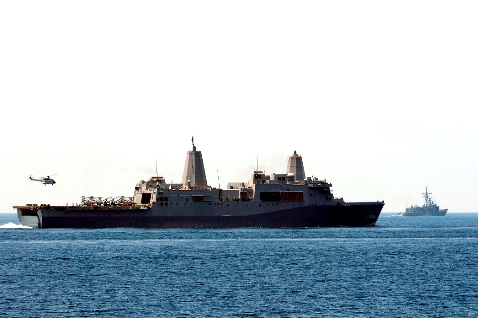 US Navy 110419-N-RC734-376 An AS-332 Super Puma helicopter lifts off from the amphibious transport dock ship USS Green Bay (LPD 20) after deliverin