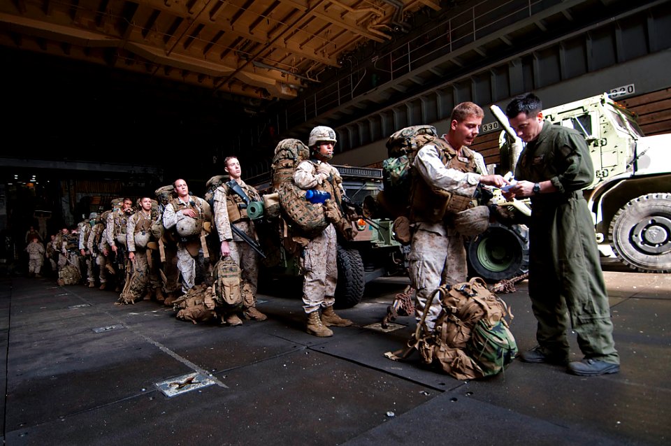 US Navy 110423-N-RC734-312 Marines assigned to the 13th Marine Expeditionary Unit (MEU) prepare to board a landing craft air cushion