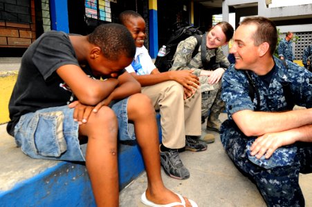 US Navy 110421-F-CF975-177 Service members talk to Harbor View Primary School students during a Continuing Promise 2011 community service project