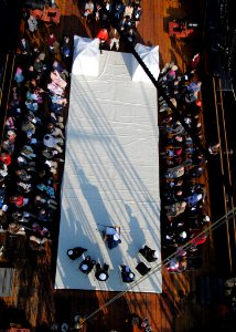 US Navy 110424-N-7642M-109 The crew of USS Constitution and guests observe Easter aboard the ship